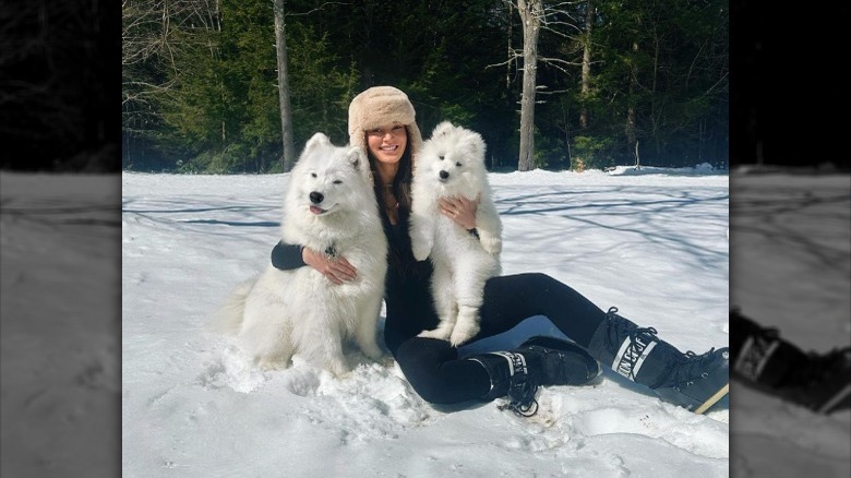 Kristin Juszczyk smiling with her dogs