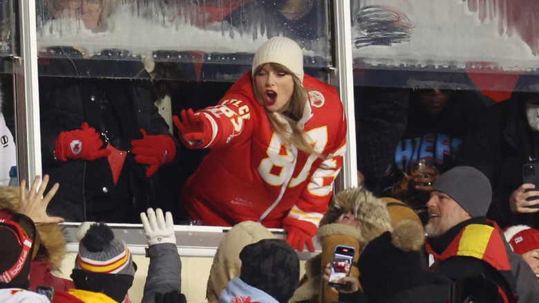 Taylor Swift wearing Chiefs jacket