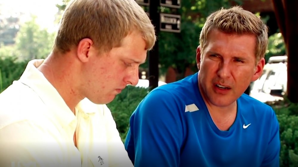 Kyle Chrisley and Todd Chrisley in a scene from Chrisley Knows Best 