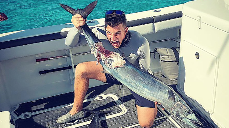 Kyle Dickard with a fish