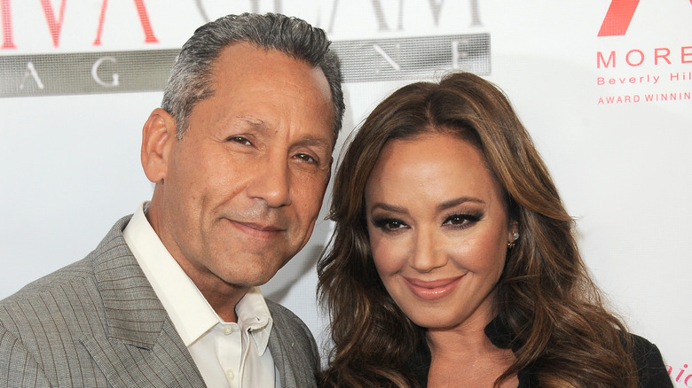 Angelo Pagan and Leah Remini pose