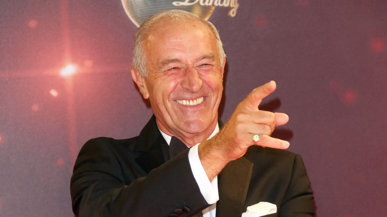 Len Goodman smiling and making hand gesture