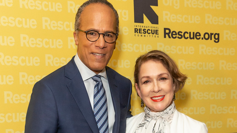 Lester Holt smiles alongside wife Carol Hagen-Holt at an event