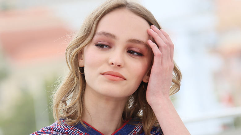 Lily-Rose Depp attends a photocall