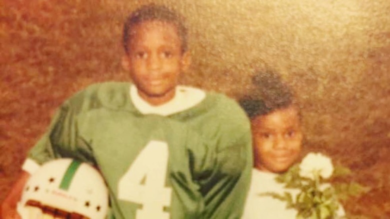 Little Tim Montgomery in football gear