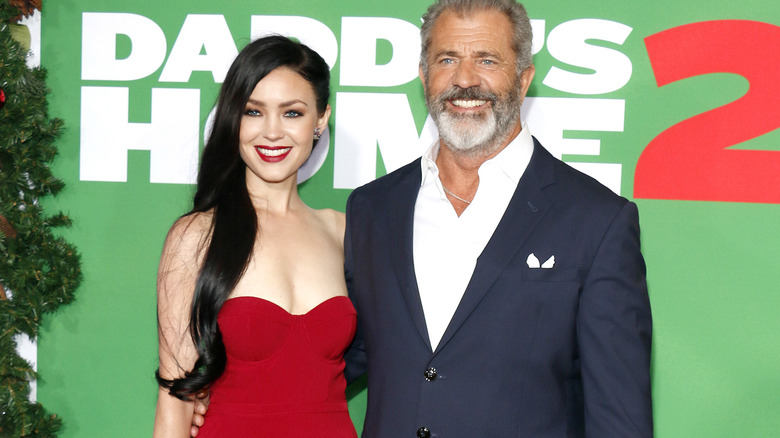 Mel Gibson and Rosalind Ross on a red carpet