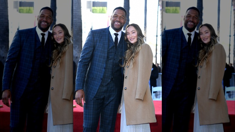 Michael Strahan and Kayla Quick posing together