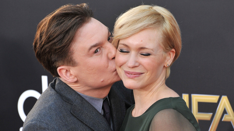 Mike Myers kissing wife Kelly Tisdale on the red carpet
