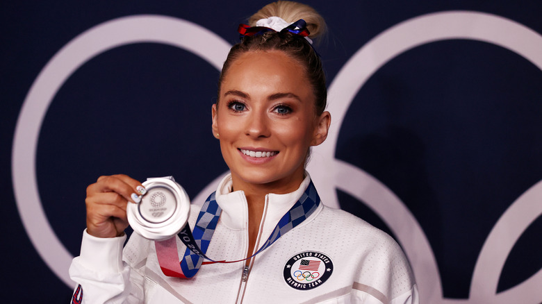 MyKayla Skinner holding a metal