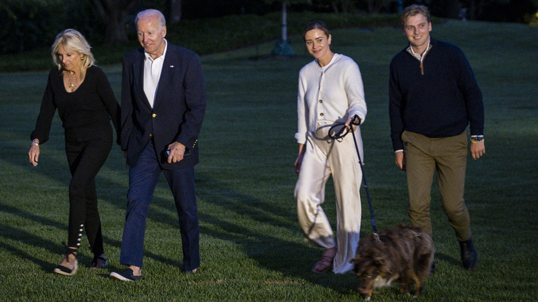 Naomi Biden and Joe, walking dog with Naomi and Peter Neal