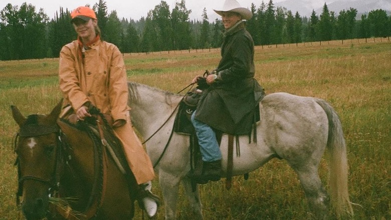 Naomi and Peter riding horses