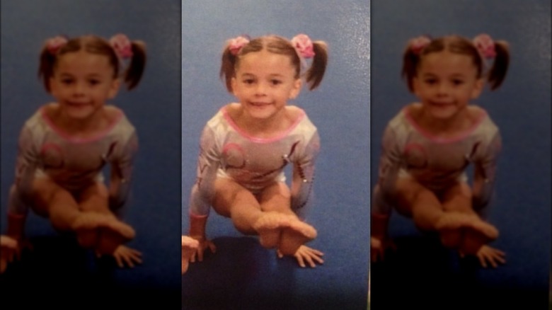 Olivia Dunne as a young child doing gymnastics 