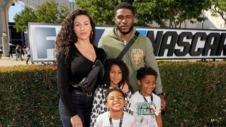 Lilit Avagyan and Reggie Bush pose with their kids, Briseis, Uriah and Agyemang