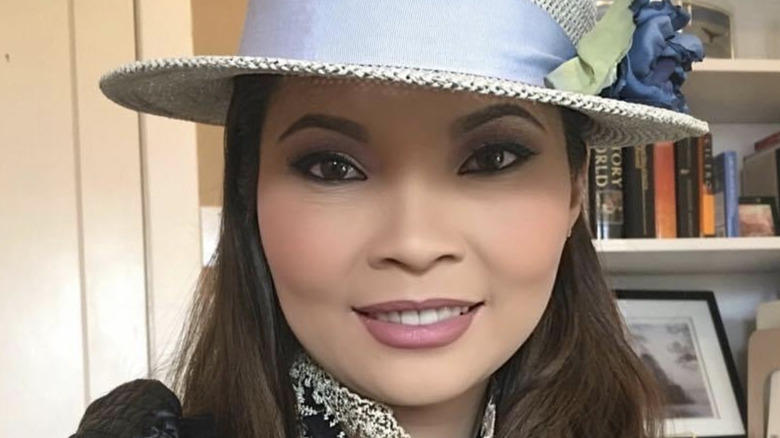 Jennie Nguyen takes a selfie in a hat