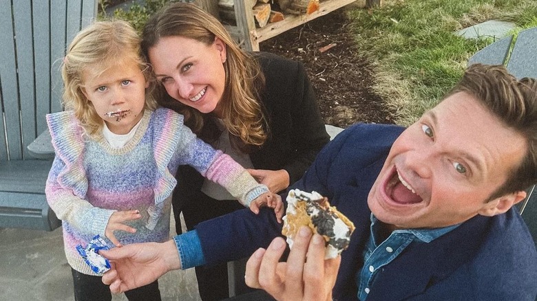 Ryan Seacrest poses with Meredith and Flora