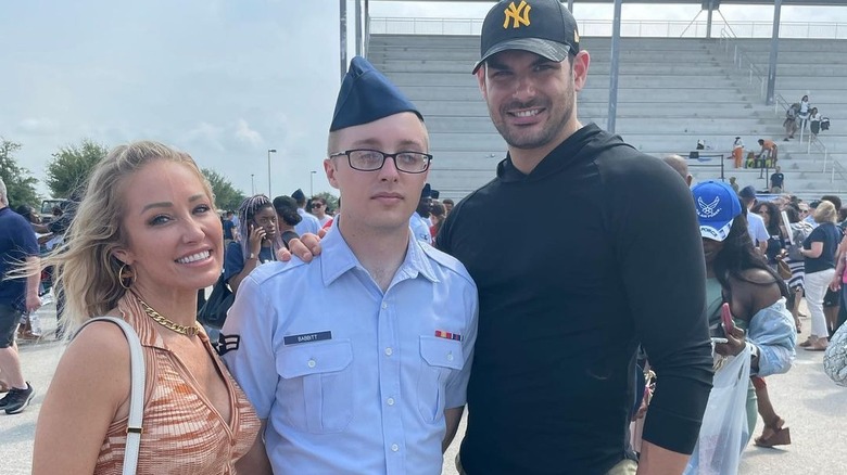 Mary Fitzgerald, Romain Bonnet, and Austin posing for a picture