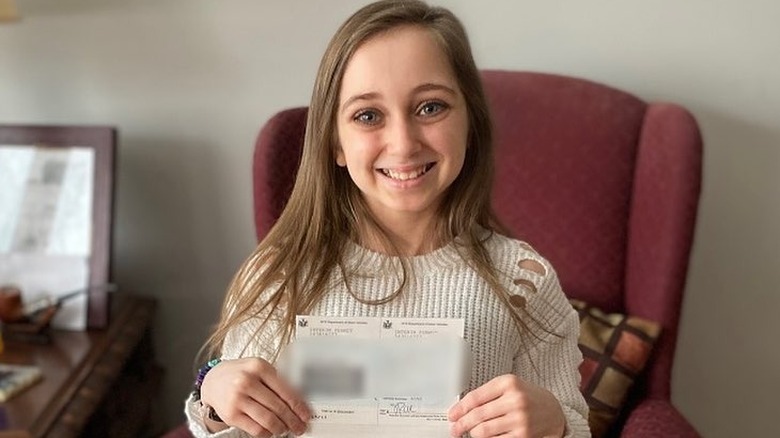 Shauna Rae holding her permit