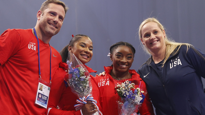 Simone Biles and Cecile Laurent Landi posing