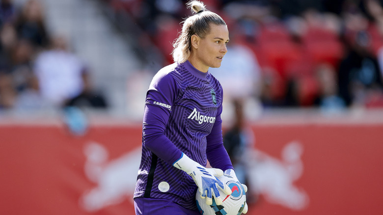 Ashlyn Harris wearing purple