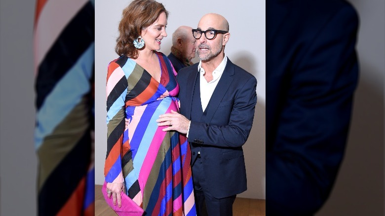 Pregnant Felicity Blunt and Stanley Tucci at a premiere