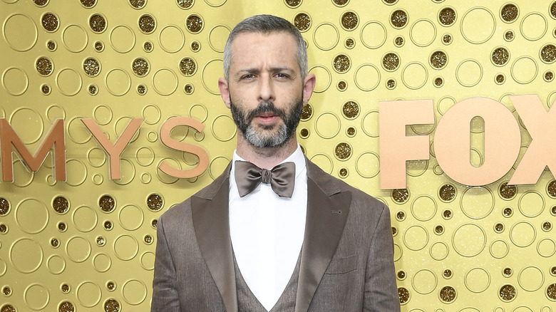 Jeremy Strong wearing brown tuxedo