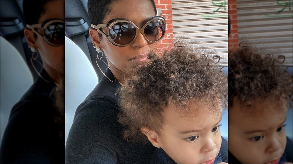 Tamron Hall taking selfie with baby 