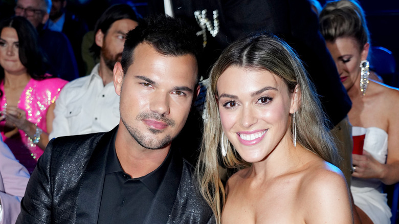 Taylor Lautner and Taylor Dome smiling