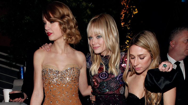 Taylor Swift, Emma Stone, and Ashley Avignone at an event