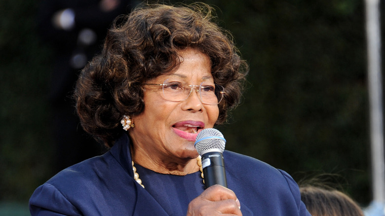 Katherine Jackson holding a microphone