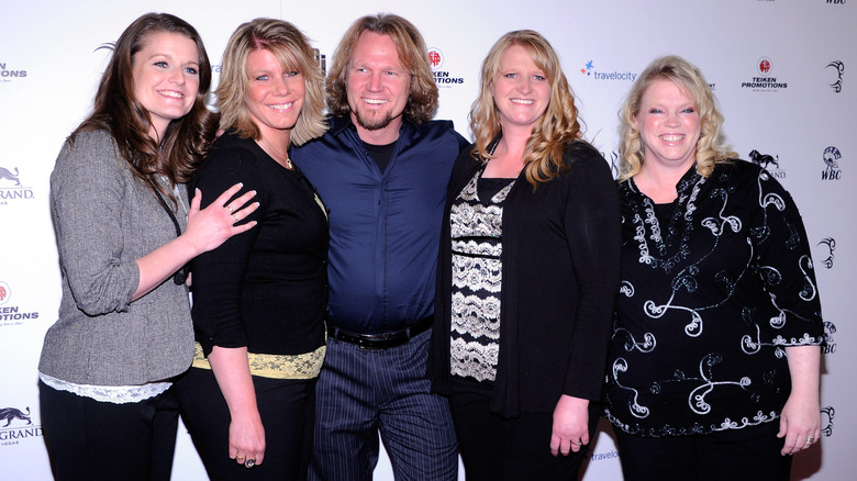 Kody Brown and the Sister Wives smiling