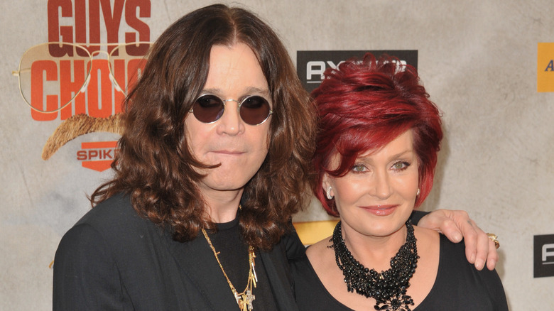 Ozzy Osbourne posing with Sharon Osbourne