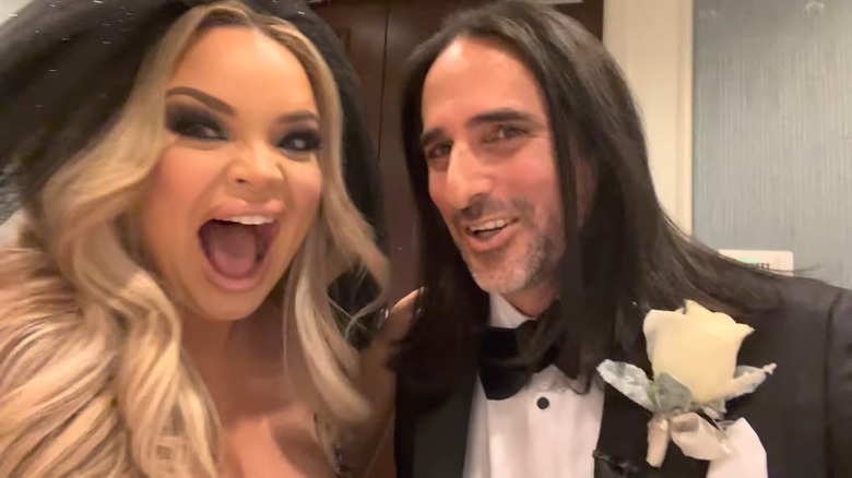 Trisha Paytas and Moses Hacmon smile