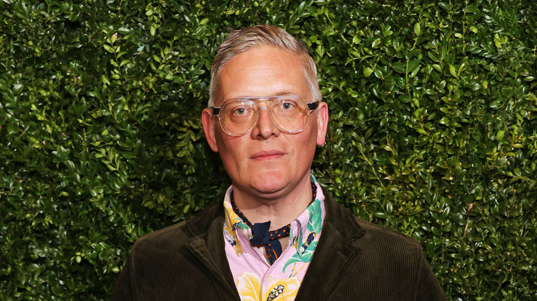 Giles Deacon posing