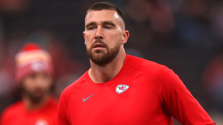 Travis Kelce training in a red Chiefs shirt