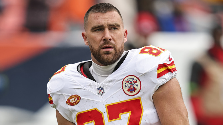 Travis Kelce in a white Chiefs jersey