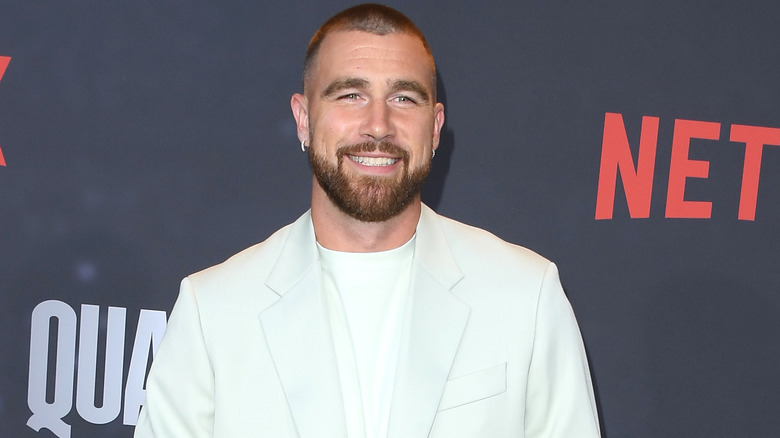 Travis Kelce all smiles on the red carpet