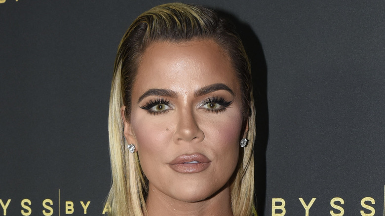 Khloe Kardashian slicked-back blond hair