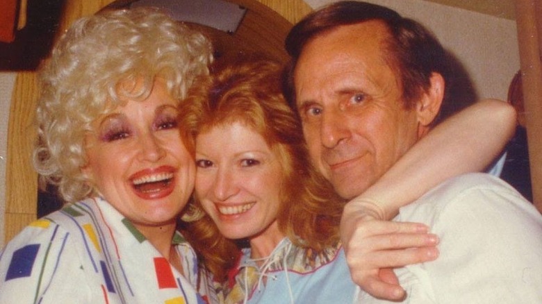 Dolly Parton, Judy Ogle, and Don Warden posing together