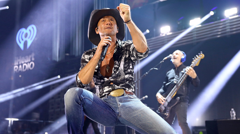 Tim McGraw singing into microphone