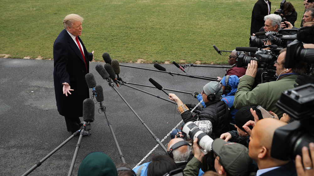 Donald Trump talking to reporters