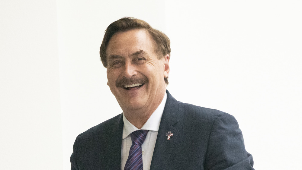 Mike Lindell laughing in suit