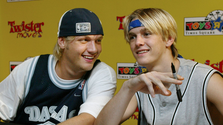 Nick and Aaron Carter smiling