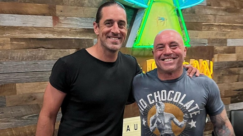 Aaron Rodgers and Joe Rogan smiling