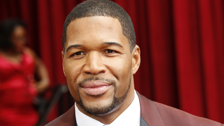 Michael Strahan posing on the red carpet