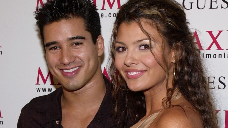 Mario Lopez and Ali Landry pose