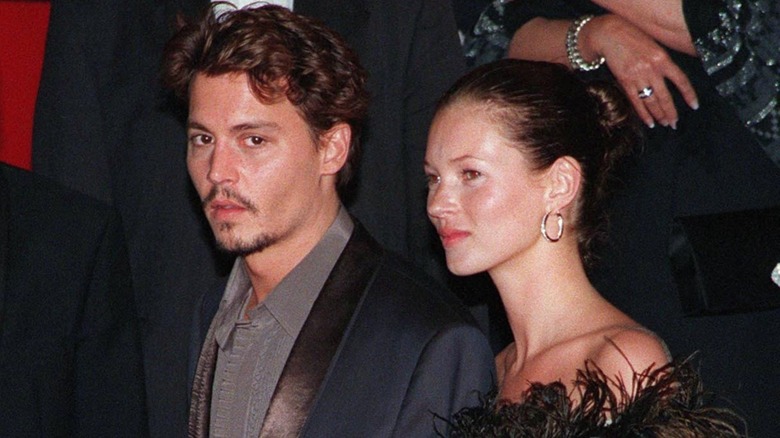 Kate Moss and Johnny Depp smiling