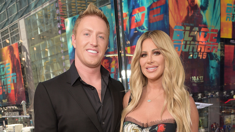 Kim Zolciak and Kroy Biermann pose 