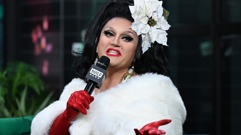 BenDeLaCreme talking into microphone