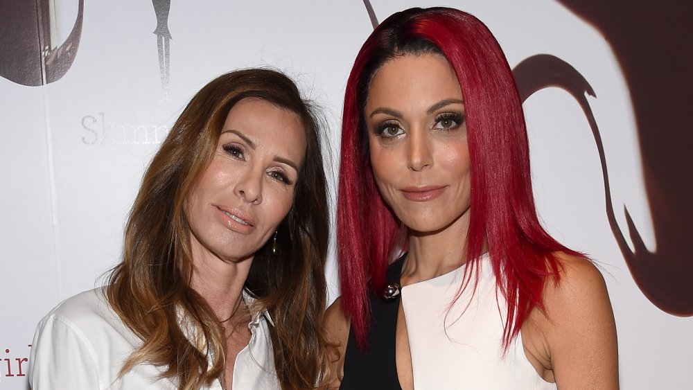 Carole Radziwill and Bethenny Frankel posing arm in arm