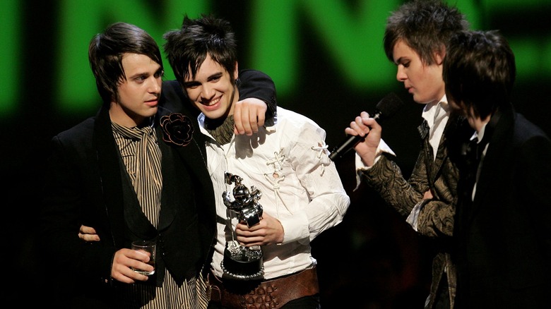 Panic! at the Disco bandmates on stage